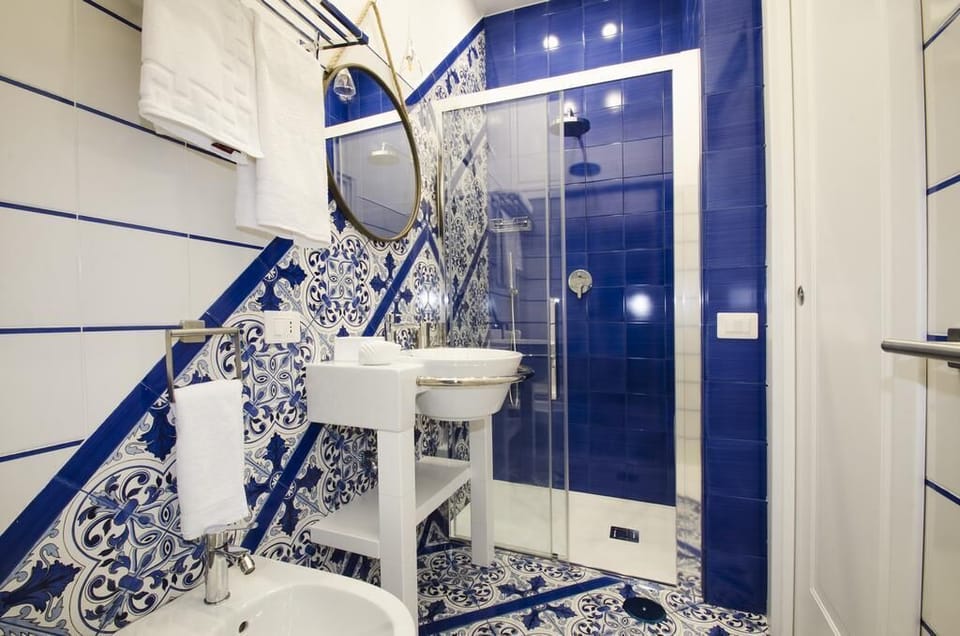 Shower, free toiletries, hair dryer, bathrobes