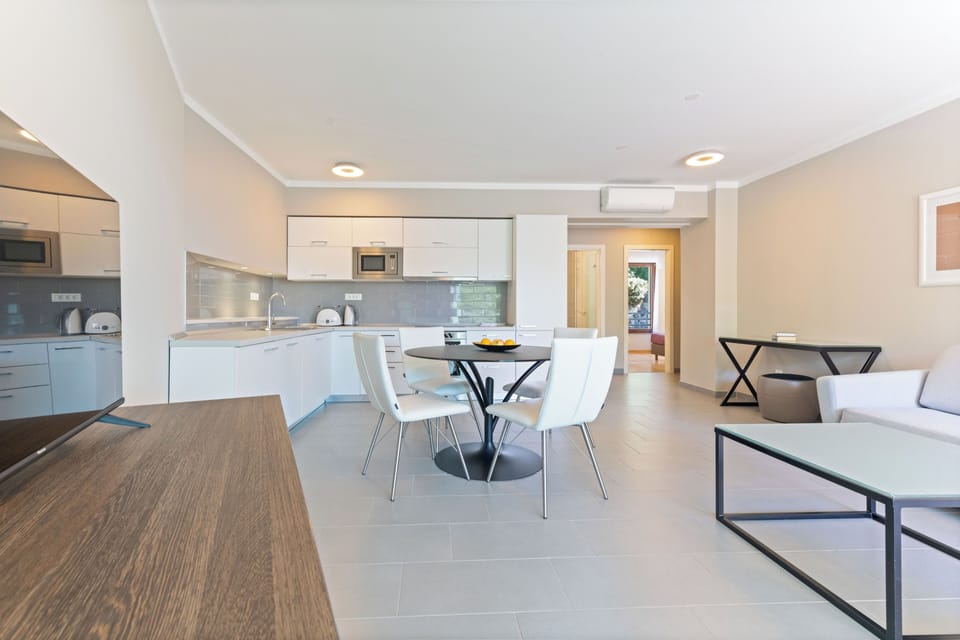 Family Apartment, 2 Bedrooms, Balcony | Private kitchen | Coffee/tea maker, electric kettle, cleaning supplies