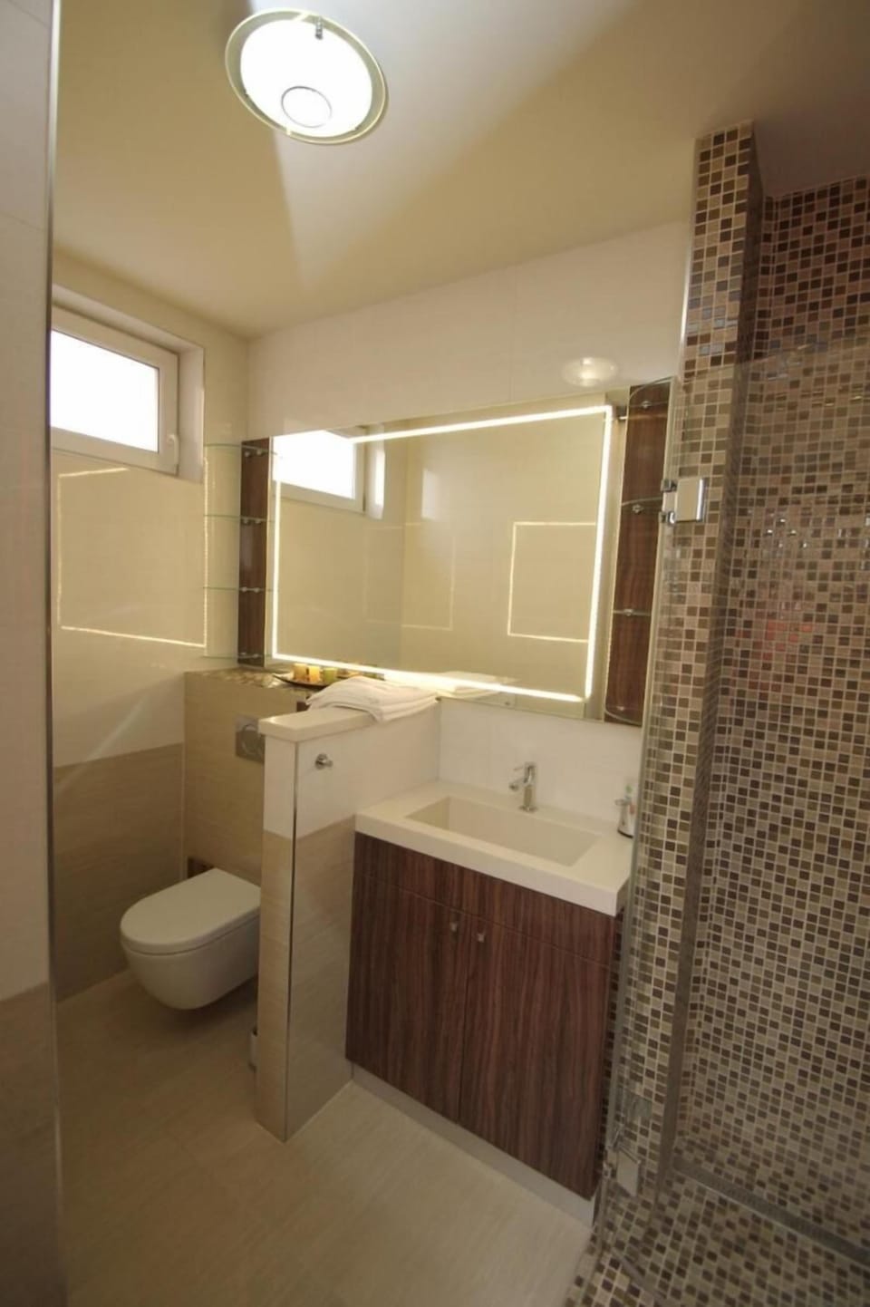 Shower, free toiletries, hair dryer, towels