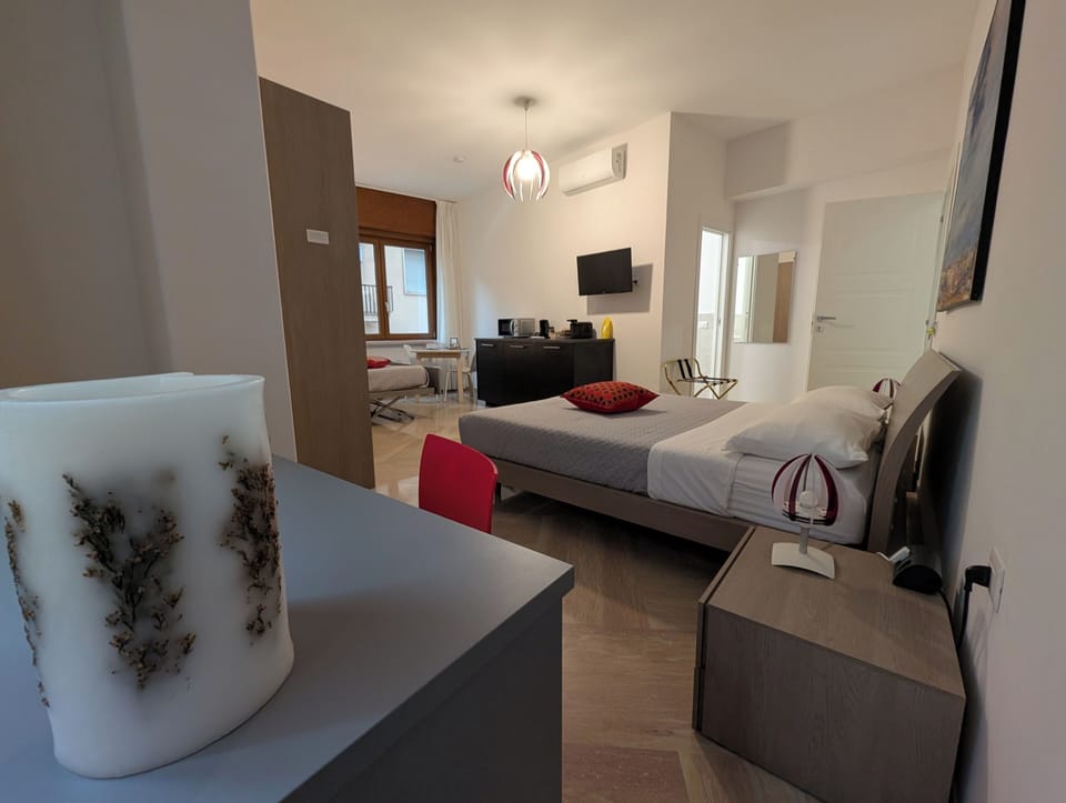 Quadruple Room Multiple Beds, Private Bathroom | Premium bedding, down comforters, minibar, in-room safe