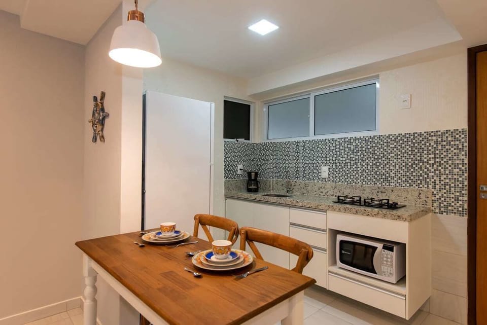 Fridge, microwave, stovetop, cookware/dishes/utensils