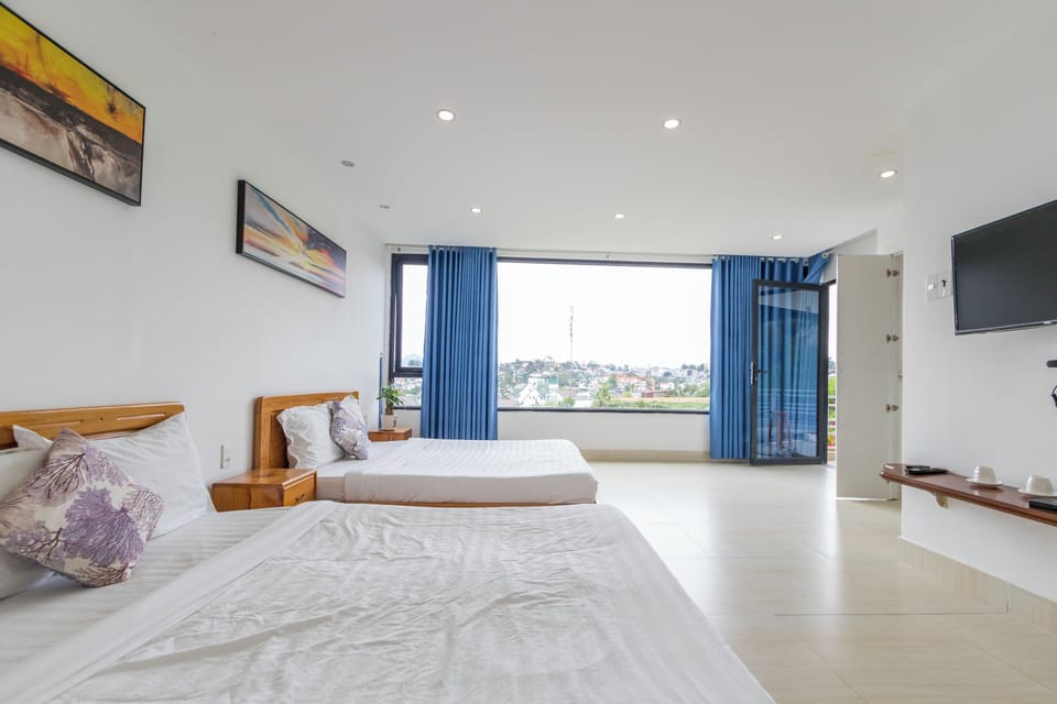 Family Quadruple Room, 2 Queen Beds, Balcony, Garden View | Hypo-allergenic bedding, soundproofing, iron/ironing board, free WiFi