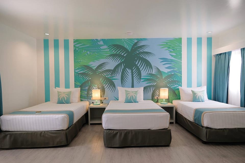 Family Room | In-room safe, desk, blackout drapes, rollaway beds