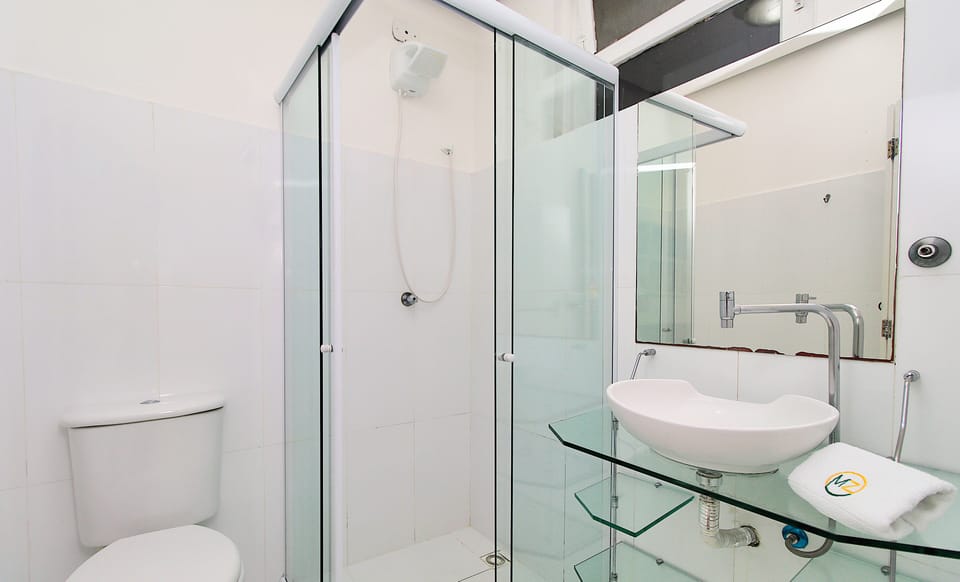 Studio, Multiple Beds, Non Smoking | Bathroom | Shower, hair dryer, towels
