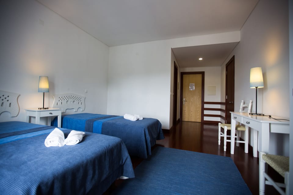 Triple Room, Private Bathroom | Blackout drapes, free WiFi, bed sheets