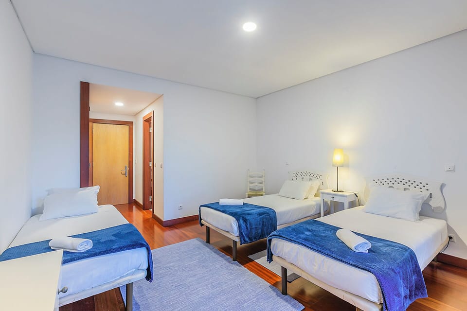 Triple Room, Private Bathroom | Blackout drapes, WiFi (free), bed sheets