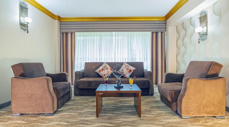 Premium Studio Suite, Valley View | Living area | 32-inch LCD TV with cable channels, TV, heated floors