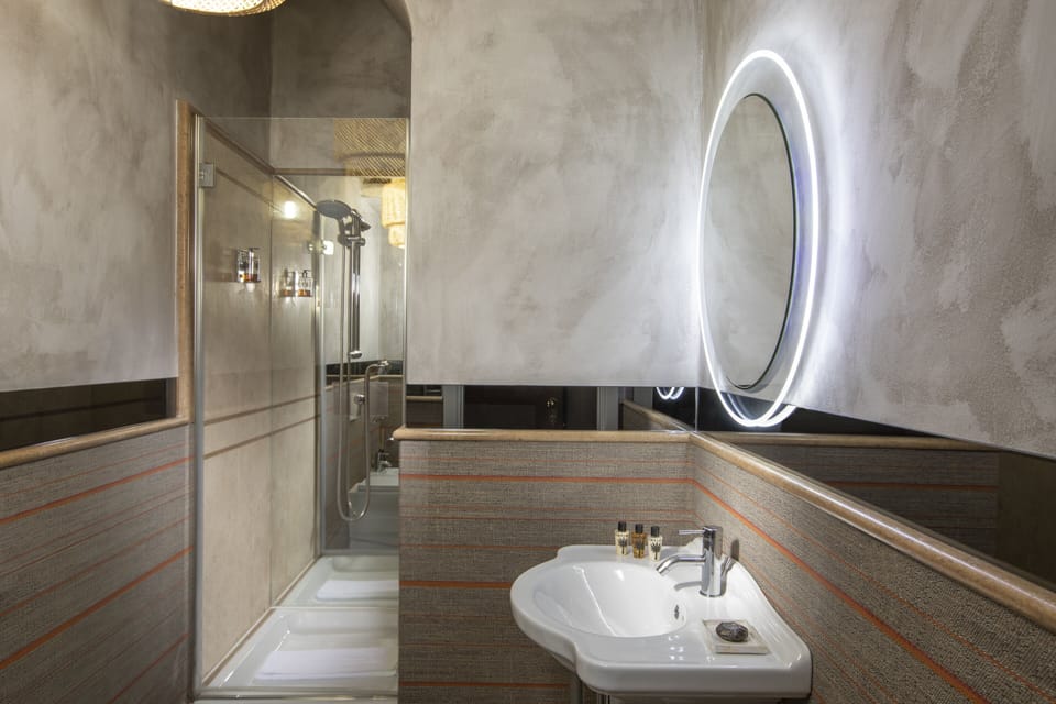 Shower, free toiletries, hair dryer, slippers