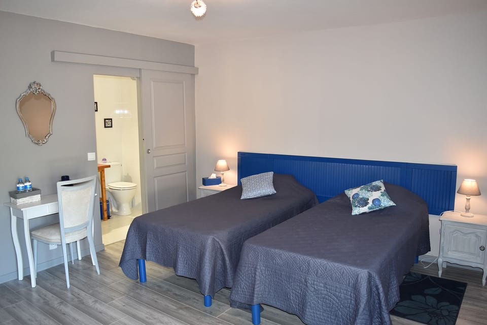 Iris Room | Individually decorated, individually furnished, desk, iron/ironing board
