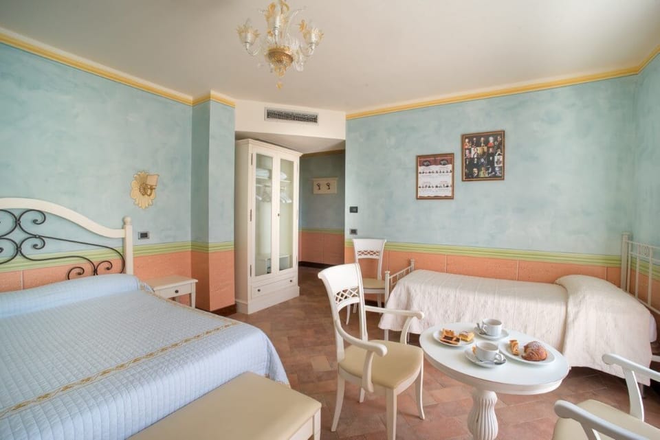 Triple Room | In-room safe, desk, laptop workspace, free cribs/infant beds