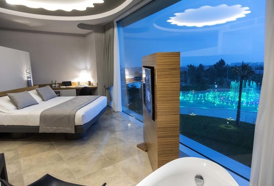 Suite, Bathtub | Minibar, in-room safe, individually furnished, desk