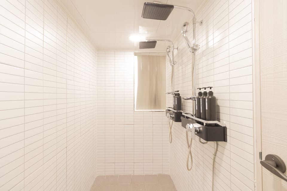 Premium Shared Dormitory, Women only, Non Smoking | Bathroom | Shower, free toiletries, hair dryer, towels