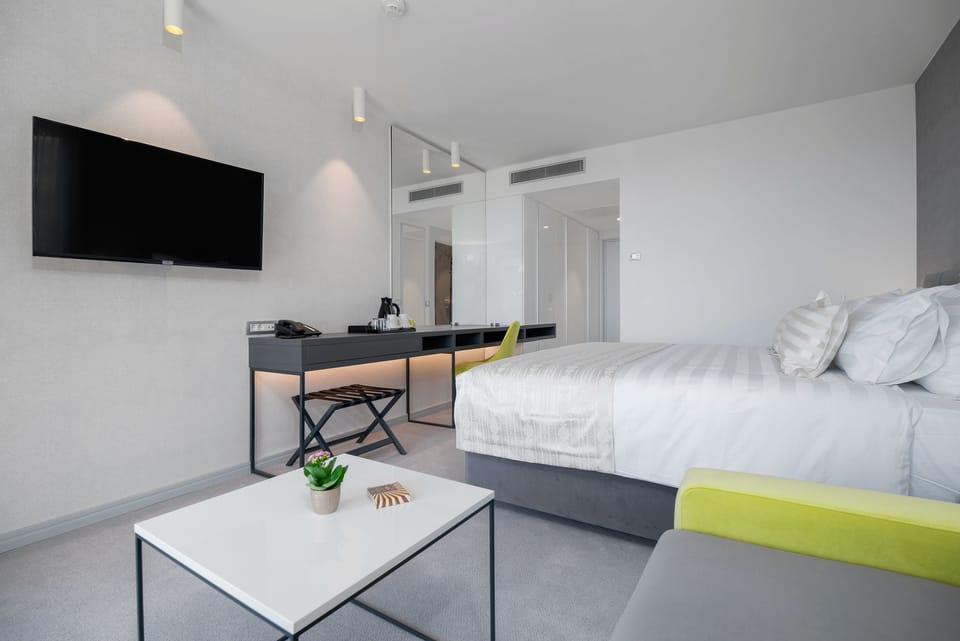 Standard Double Room, Sea View | Minibar, in-room safe, desk, laptop workspace
