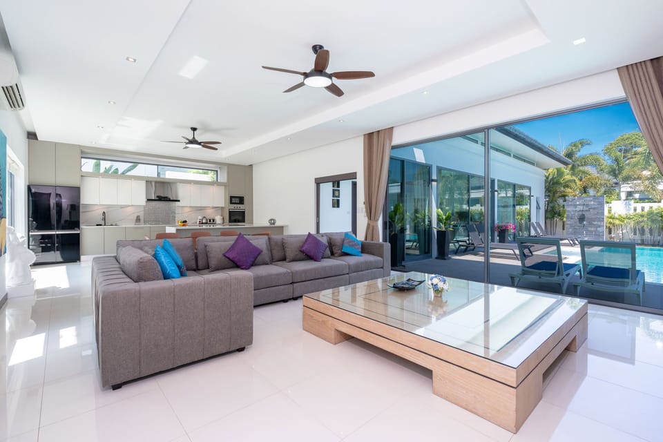 4-Bedroom Pool Villa | Living area | 45-inch flat-screen TV with cable channels, LCD TV