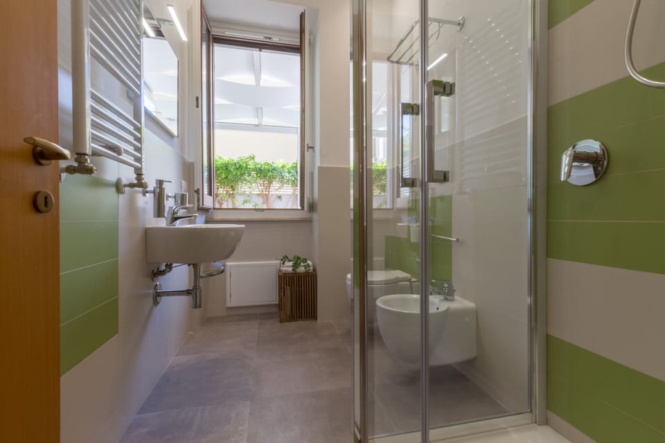 Superior Triple Room, Terrace | Bathroom | Shower, rainfall showerhead, free toiletries, hair dryer