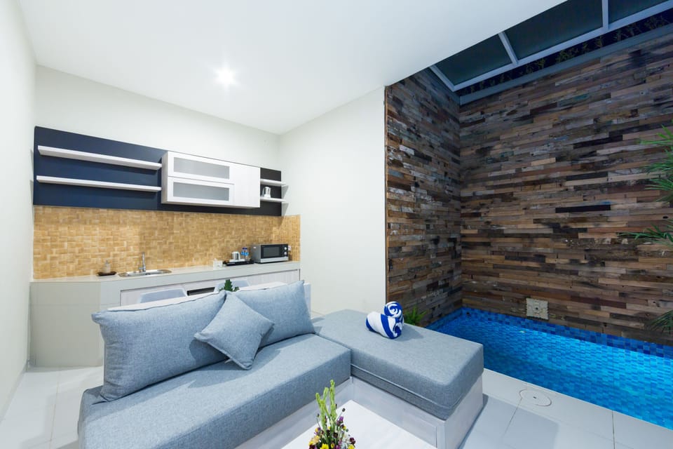 One Bedroom Deluxe Plunge Pool Villa | Living area | 41-inch flat-screen TV with cable channels, TV