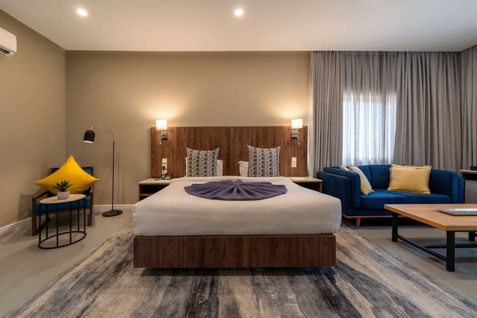 Deluxe Double Room, 2 Queen Beds, Non Smoking | Desk, WiFi (free), bed sheets