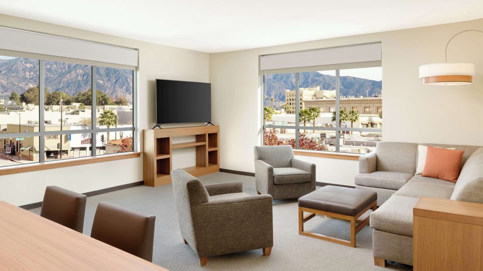 Suite, 1 King Bed with Sofa bed | In-room safe, desk, blackout drapes, iron/ironing board