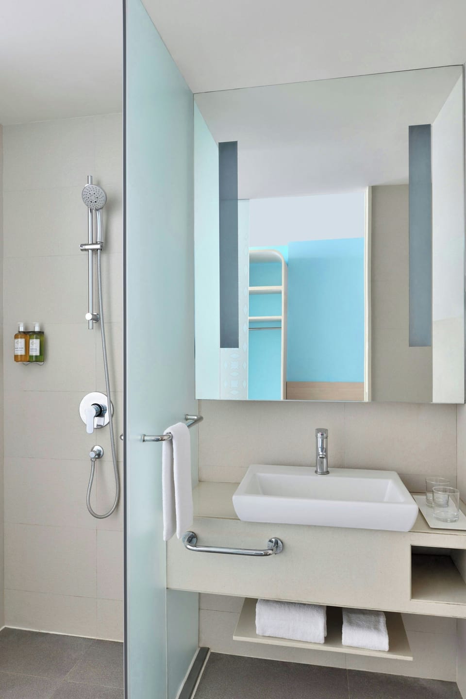 Shower, free toiletries, hair dryer, slippers