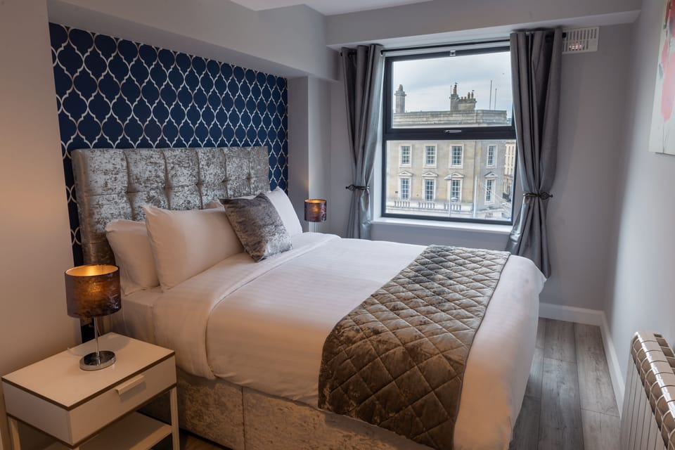 Suite, 2 Bedrooms (Sleeps 4) | Premium bedding, desk, laptop workspace, iron/ironing board