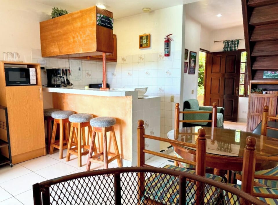 Family Apartment, Multiple Beds, Non Smoking (Floral) | Private kitchen | Fridge, microwave, stovetop, coffee/tea maker