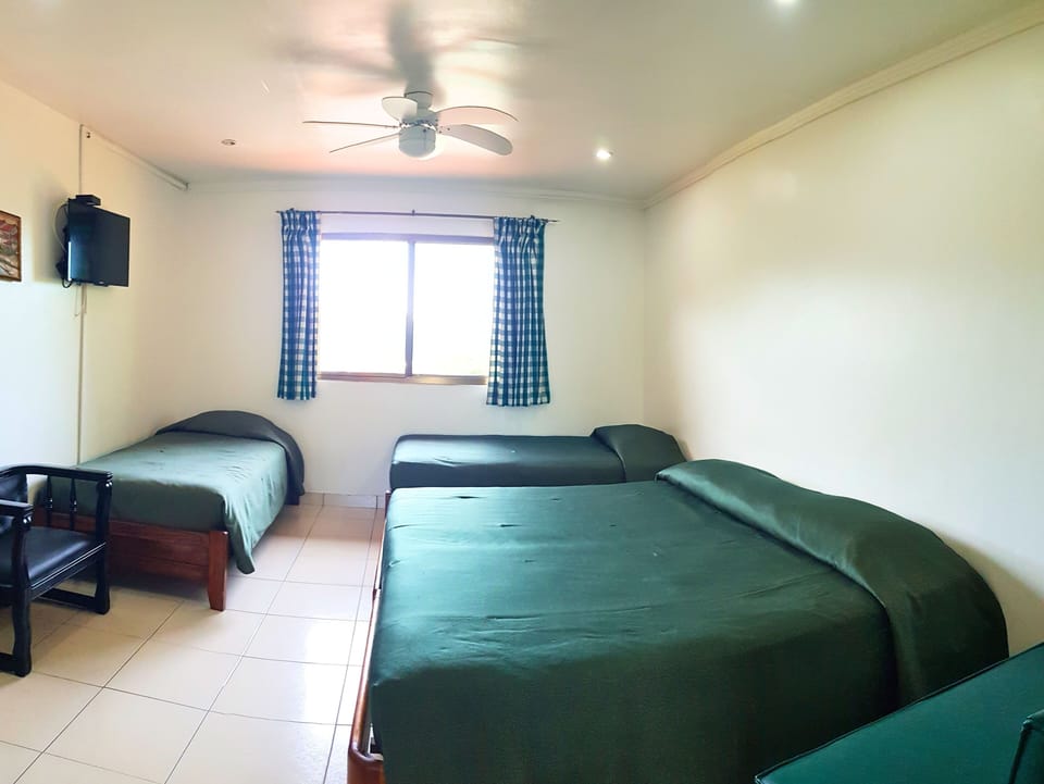 Family Apartment, Multiple Beds, Non Smoking (Floral) | Individually decorated, individually furnished, free WiFi, bed sheets