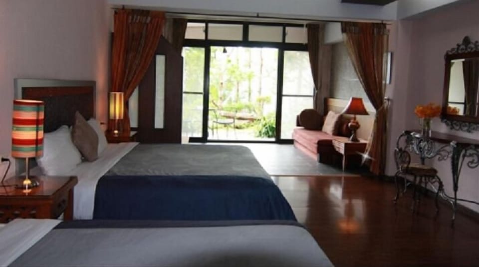 Family Quadruple Room, Park View | Individually decorated, individually furnished, blackout drapes