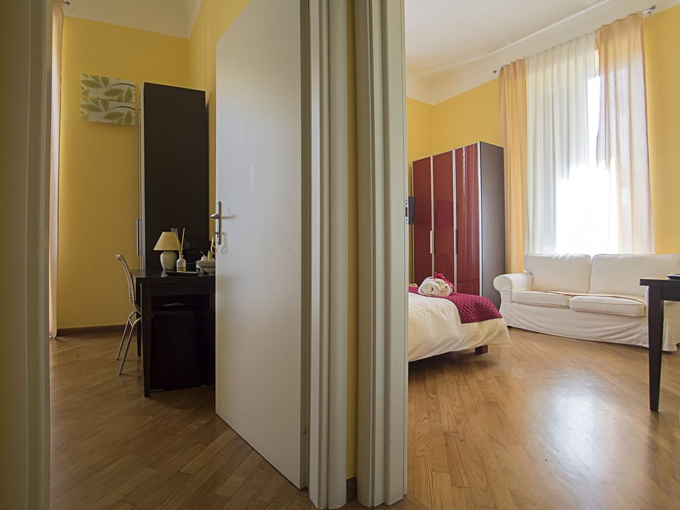 Family Quadruple Room, Balcony | Frette Italian sheets, premium bedding, down comforters, desk