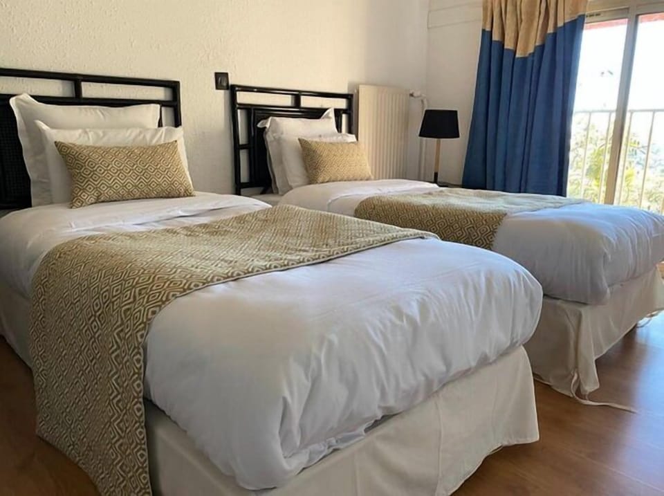 Desk, blackout drapes, free WiFi, bed sheets