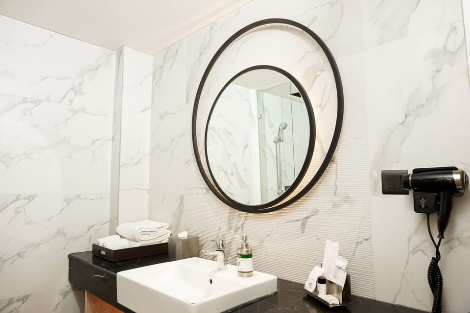 Shower, eco-friendly toiletries, hair dryer, bathrobes