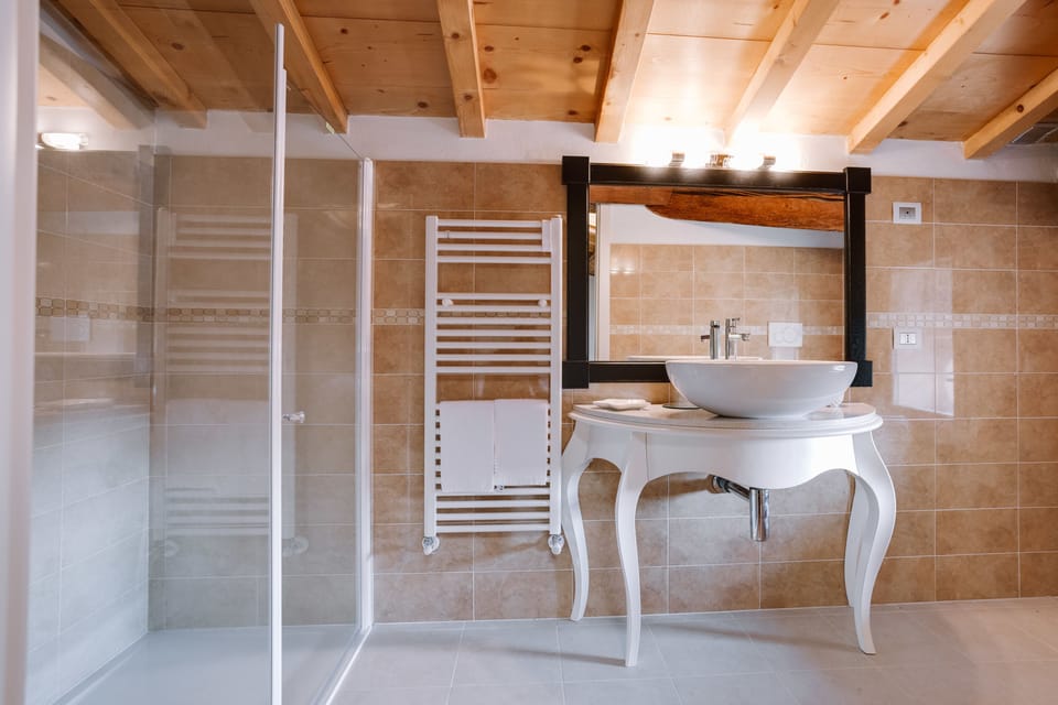 Suite | Bathroom | Hair dryer, bidet, towels, soap