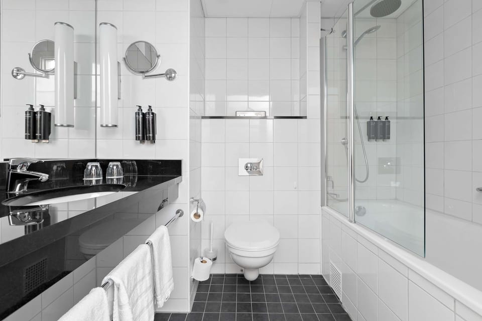 Rainfall showerhead, eco-friendly toiletries, hair dryer, towels