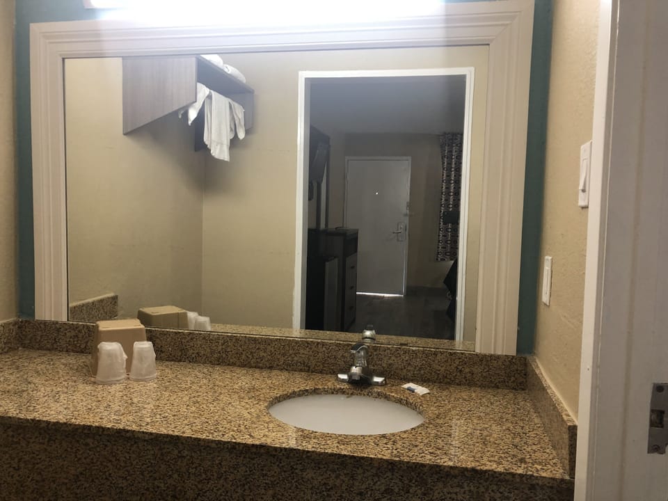 Blackout drapes, WiFi (free), bed sheets