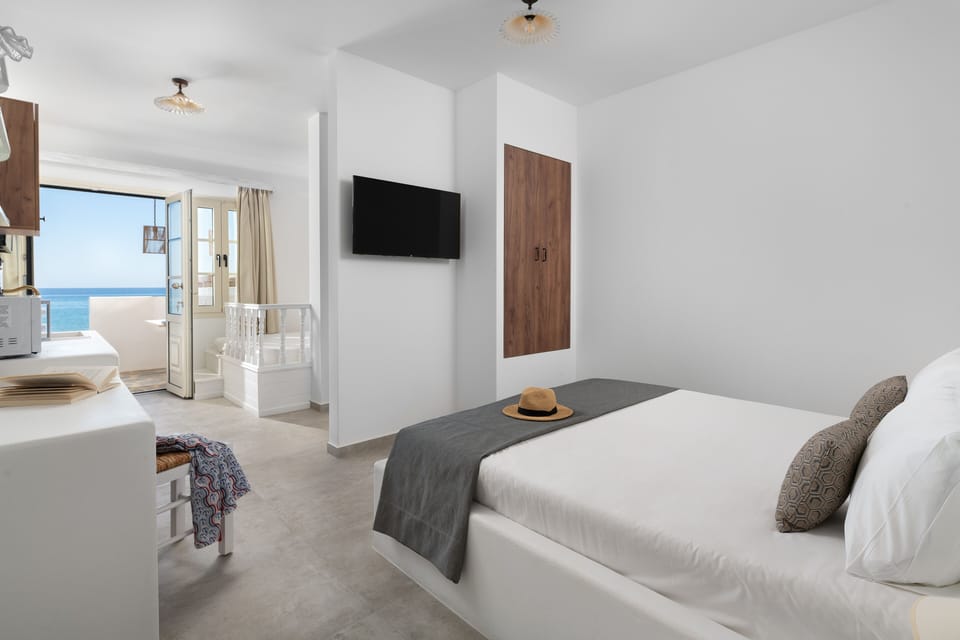 Akti Luxury Suites | Premium bedding, pillowtop beds, in-room safe, laptop workspace