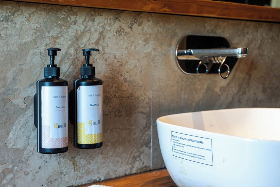 Family Suite, Multiple Beds, Smoking, River View | Bathroom | Shower, slippers, towels