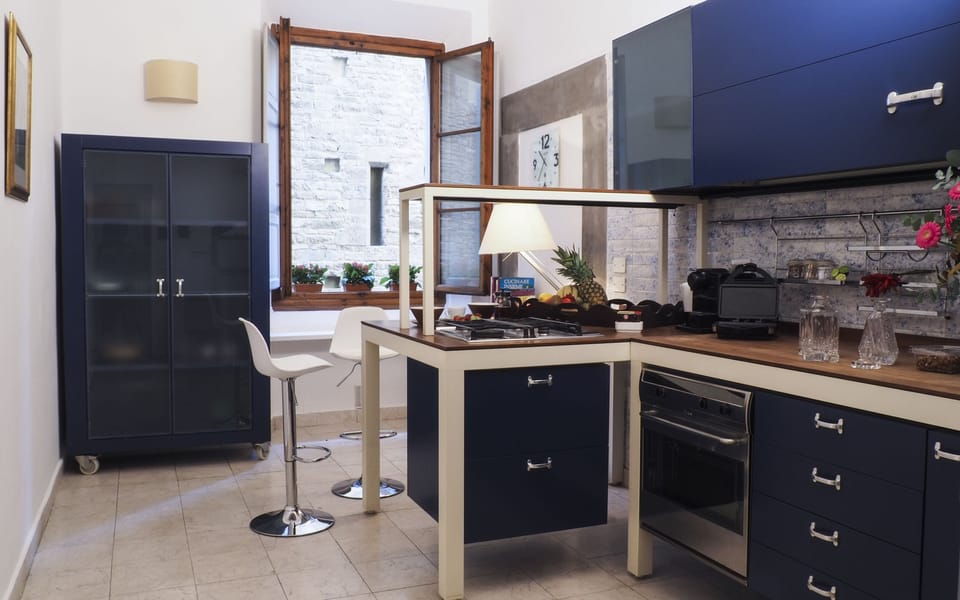 Classic Apartment | Minibar, in-room safe, iron/ironing board, free WiFi