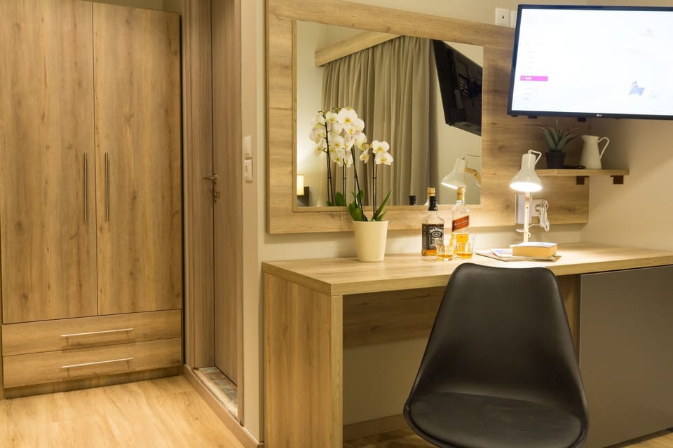 Superior Twin Room | Living area | Flat-screen TV