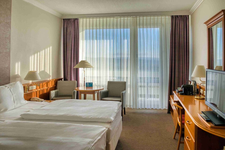 Hypo-allergenic bedding available, minibar, in-room safe, desk