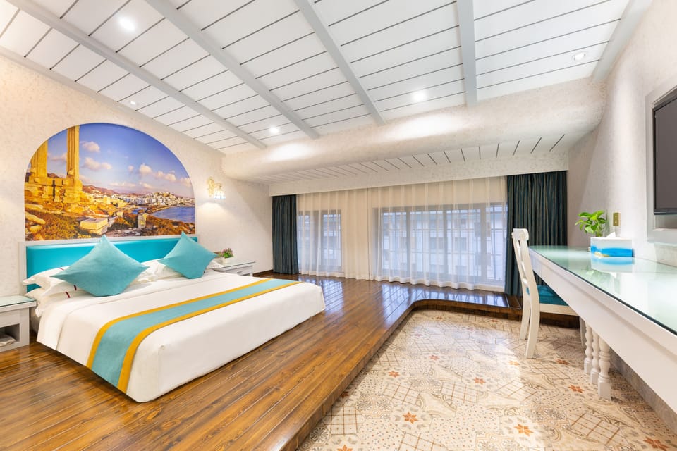 Premium bedding, down comforters, desk, laptop workspace