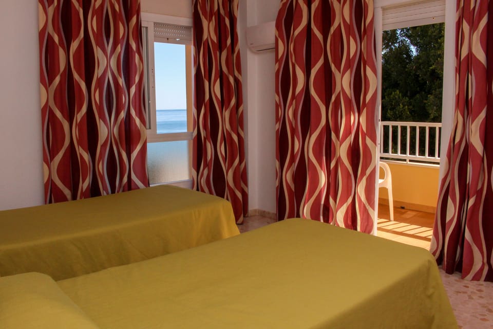 Basic Double or Twin Room, Sea View | Iron/ironing board, free WiFi, bed sheets