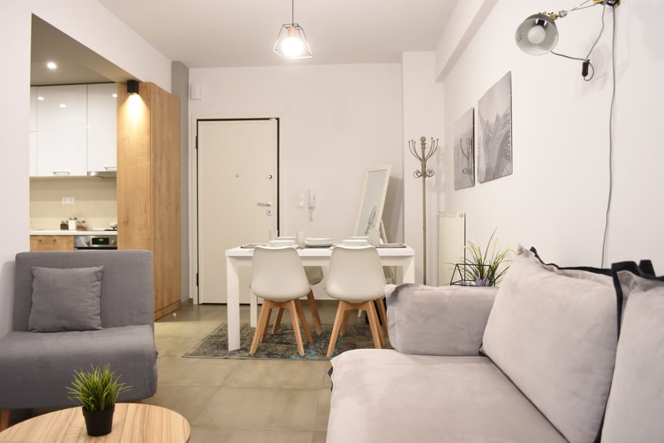 Deluxe Apartment (Heliconia) | Living area | Flat-screen TV