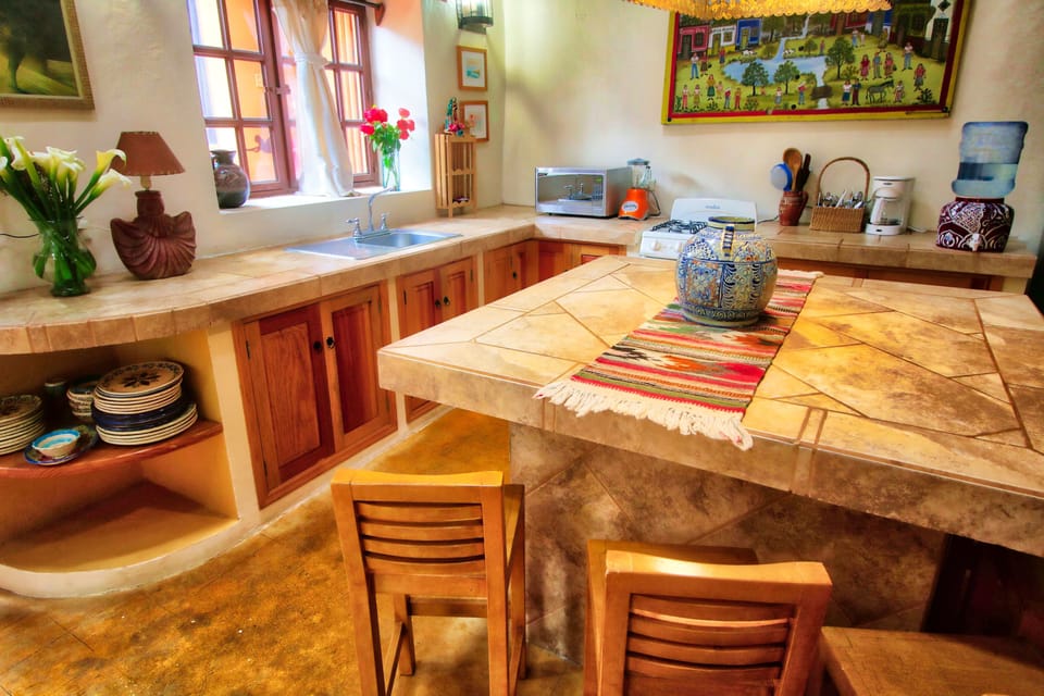 Deluxe Apartment, Multiple Beds, Non Smoking, Courtyard View (El Sol) | Private kitchen | Shared fridge, microwave