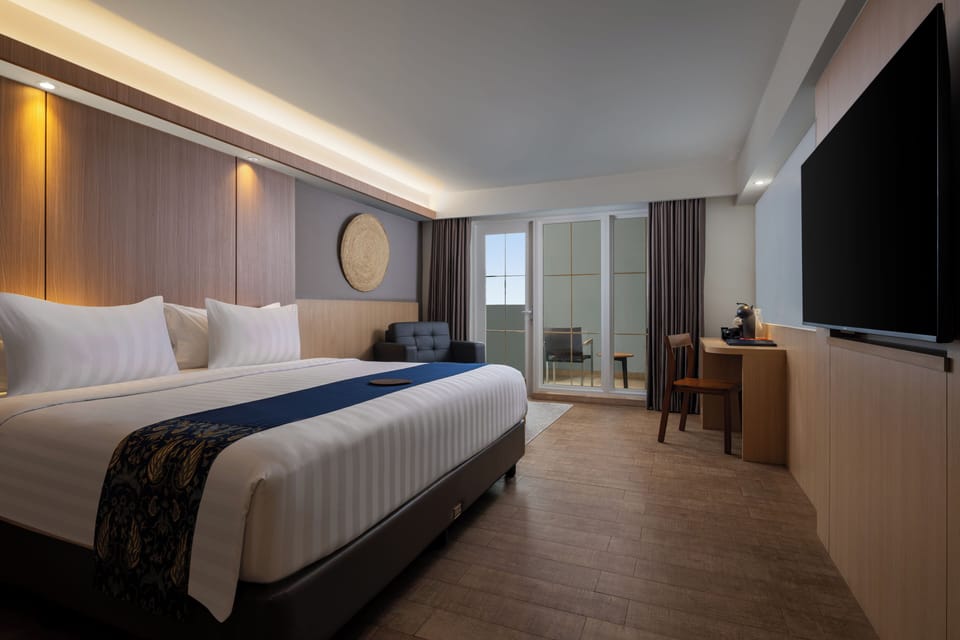 Executive Room | Premium bedding, minibar, in-room safe, desk