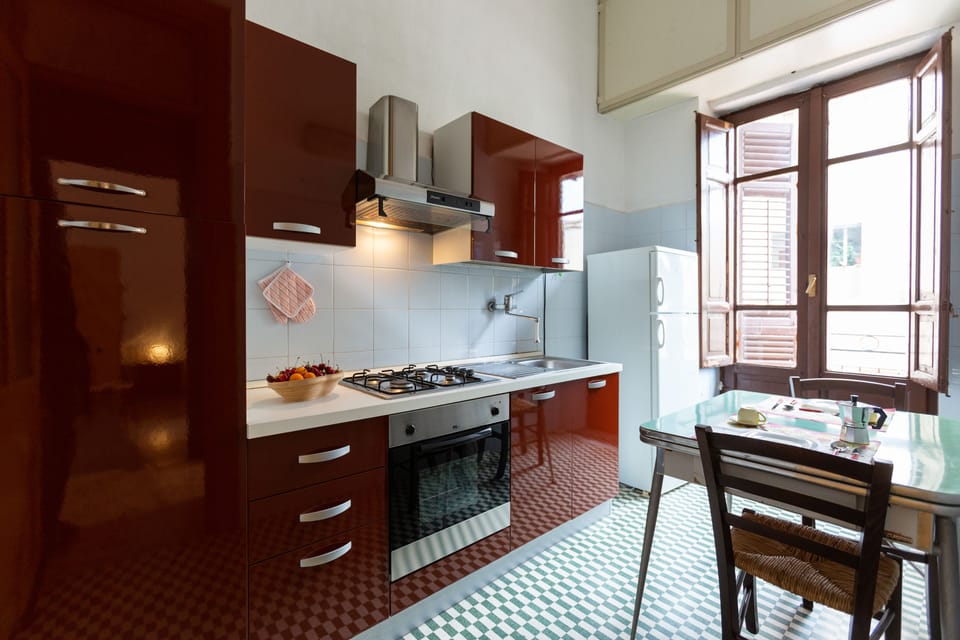 Apartment, 4 Bedrooms | Private kitchen | Full-size fridge, oven, stovetop, electric kettle