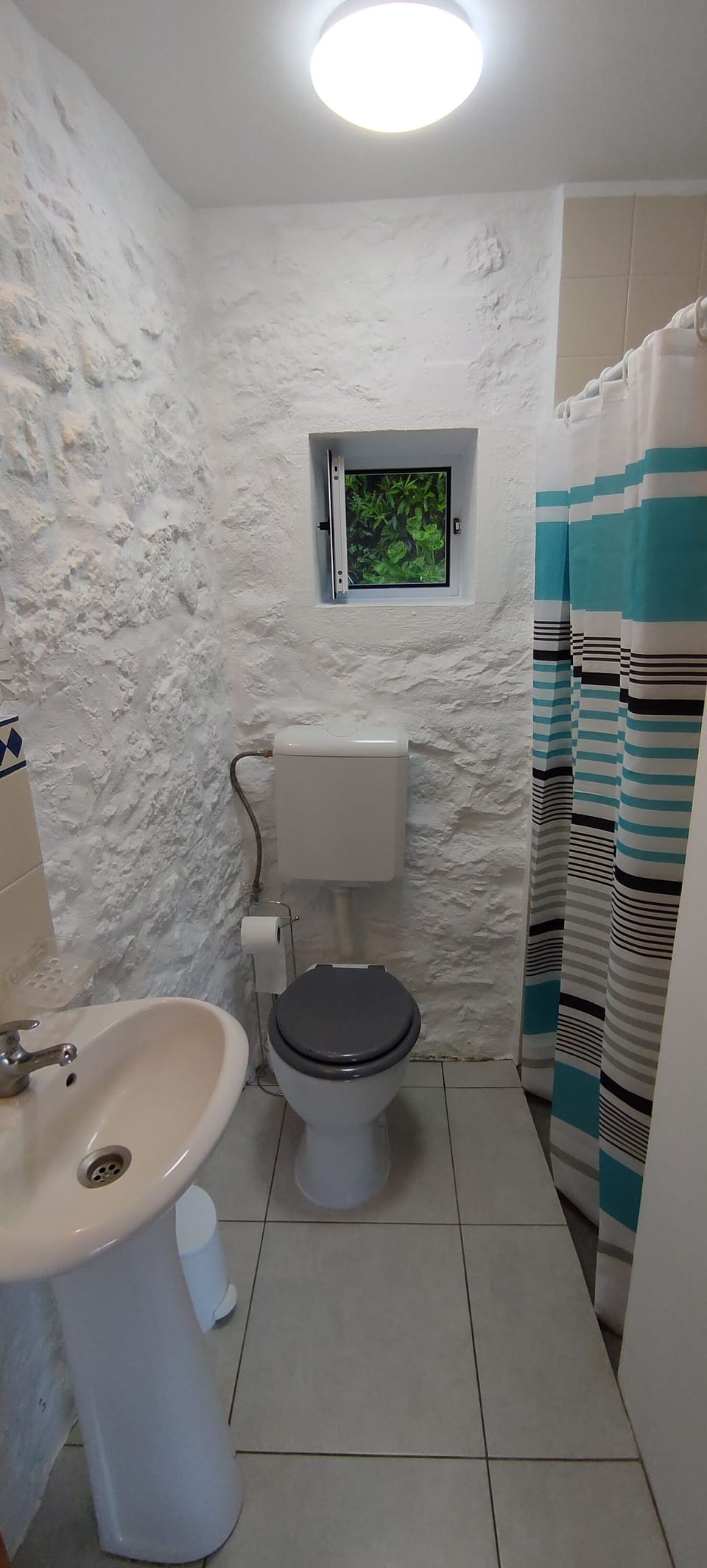 Shower, hair dryer, bathrobes, towels