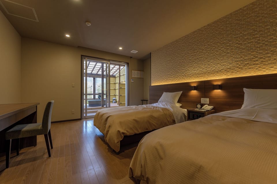 Twin Room TAKETORI with Open-Air Bath | In-room safe, desk, blackout drapes, iron/ironing board