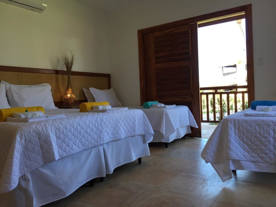 Suite, Multiple Beds | Minibar, free WiFi, bed sheets