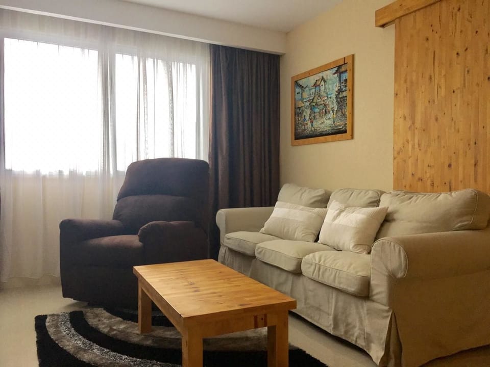 Deluxe Apartment, 2 Bedrooms | Living room | LCD TV
