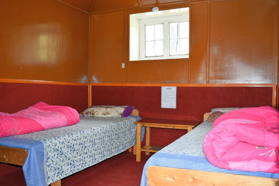 Economy Room, 2 Twin Beds, Non Smoking, Mountain View | 2 bedrooms, WiFi (surcharge), bed sheets
