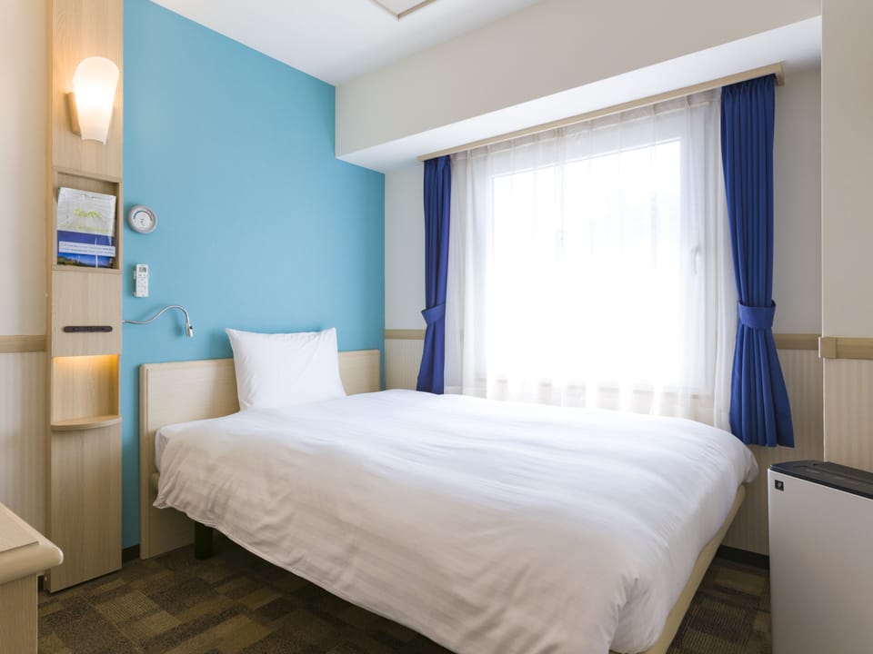 Premium Single Room, Non Smoking | Desk, blackout drapes, iron/ironing board (on request), bed sheets